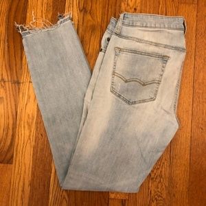 AE Extreme Flex light wash jeans